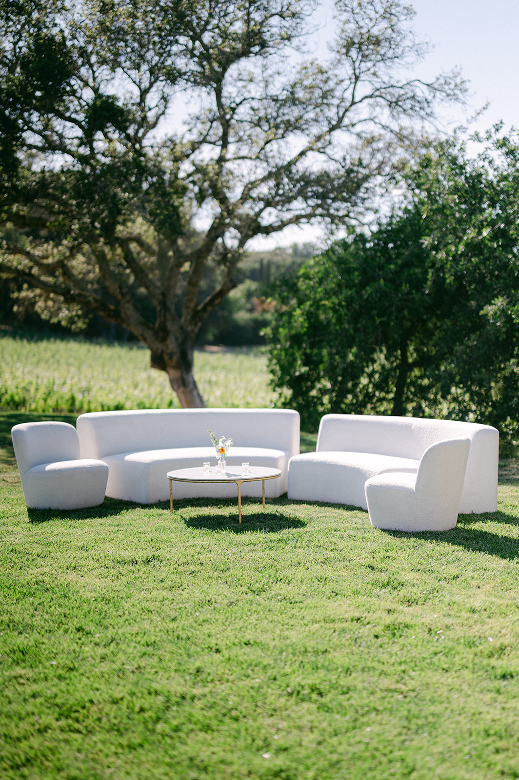 Cocktail hour seating with white couches. 