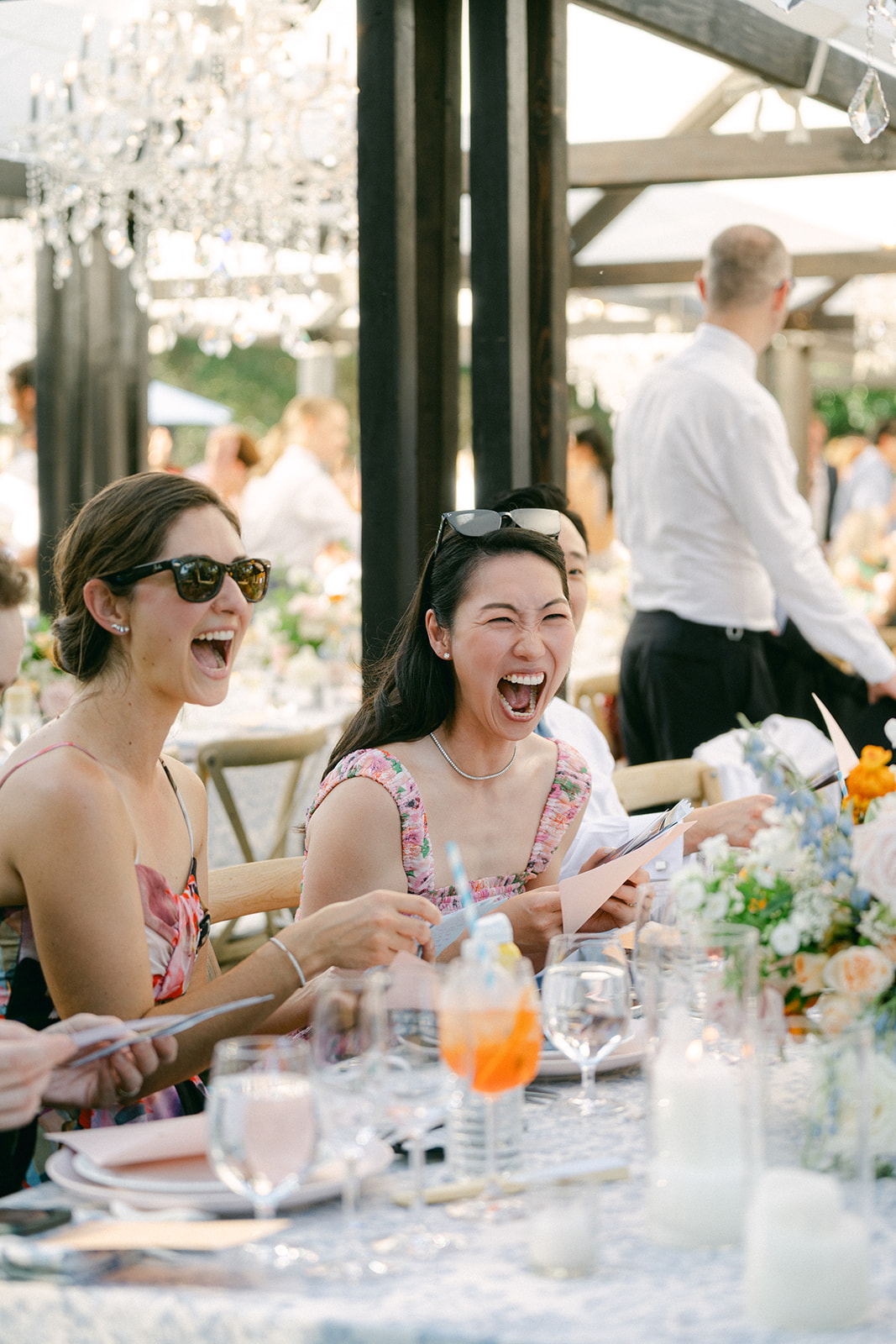 Guests reading personlized notes from the couple at a Napa wedding reception.