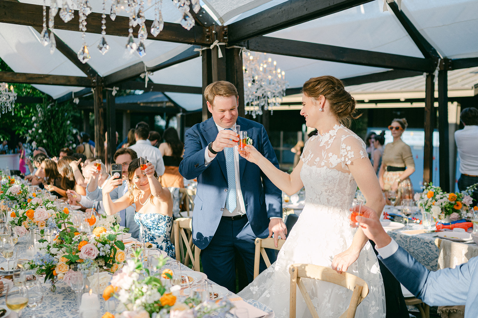 Couple sharing a shot at their reception in Napa.