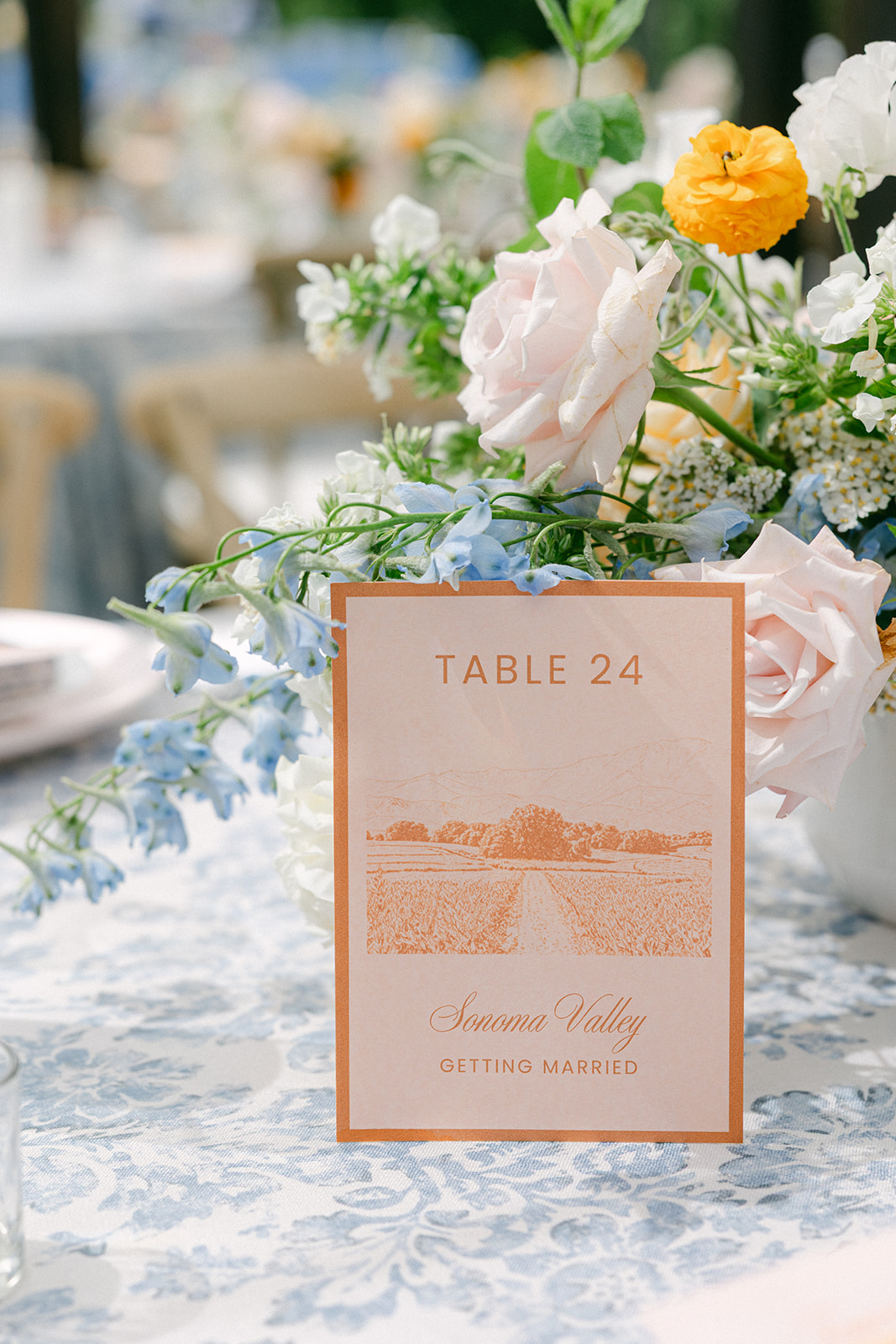 Orange reception table numbers at Sonoma Vineyard Estate.