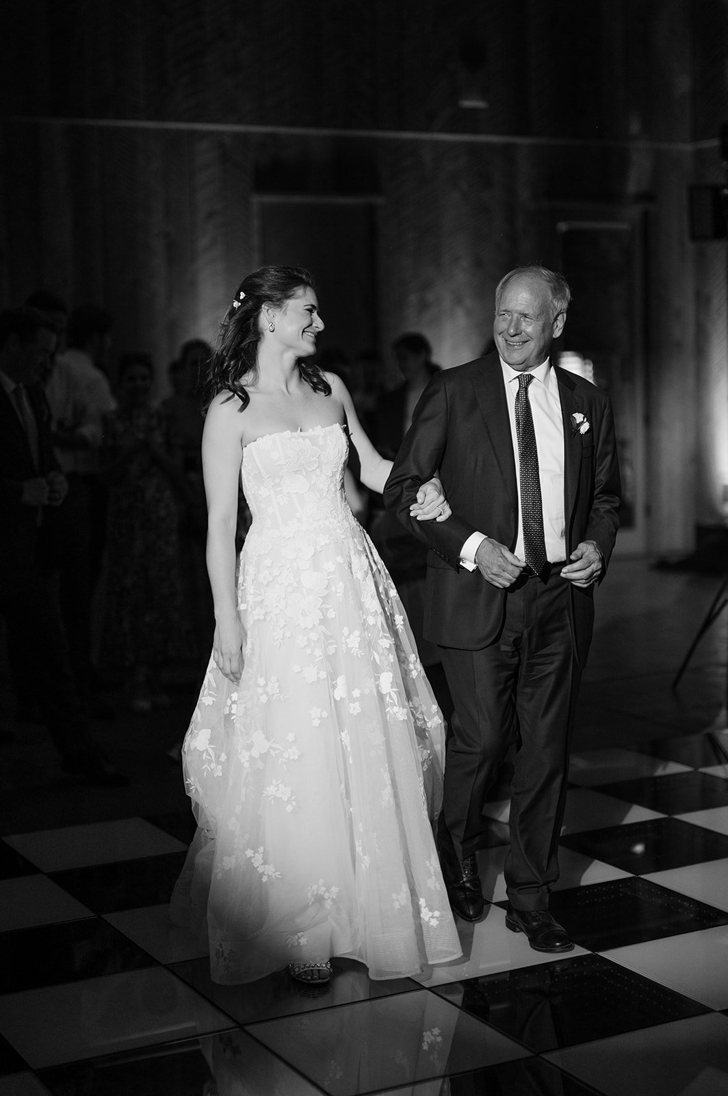 Father-daughter dance on a checkered dance floor in Napa.