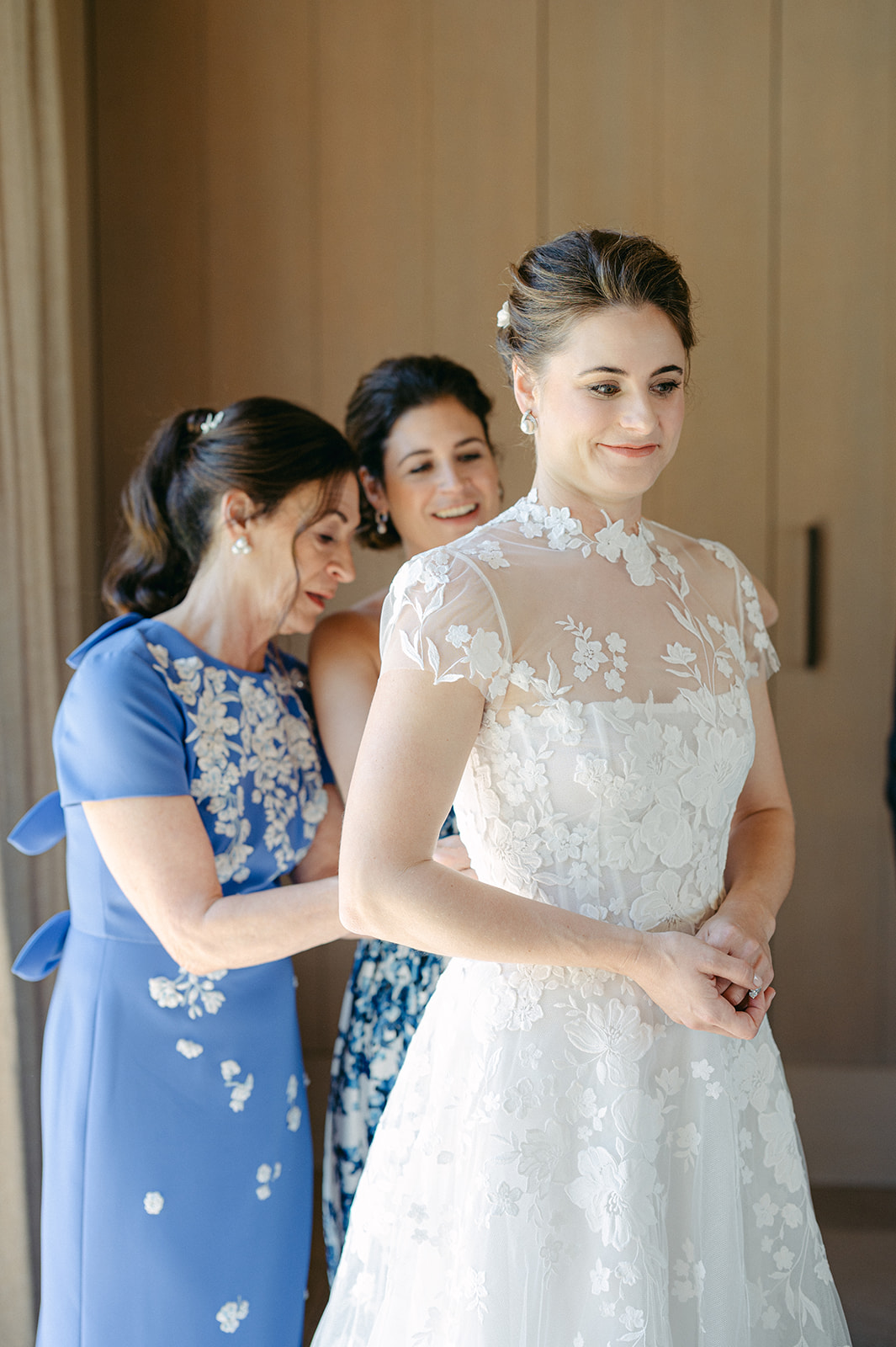 Bride getting ready with loved ones at a Sonoma Vineyard Estate wedding.