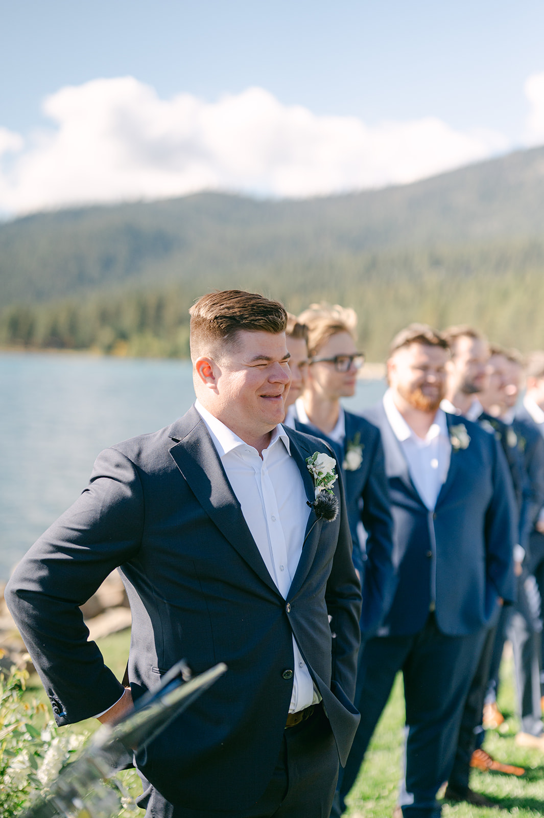 Groom teary-eyed as he sees his bride walk down the aisle.