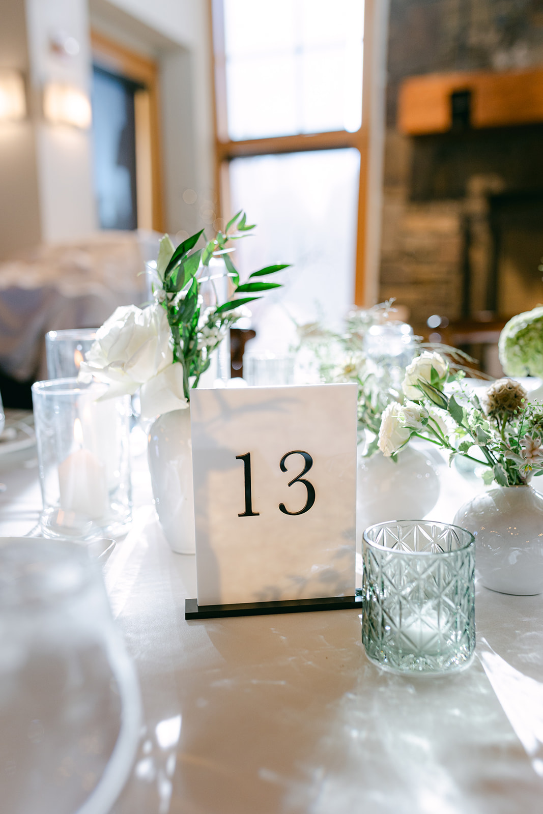Modern, minimalist white and black wedding table number details.