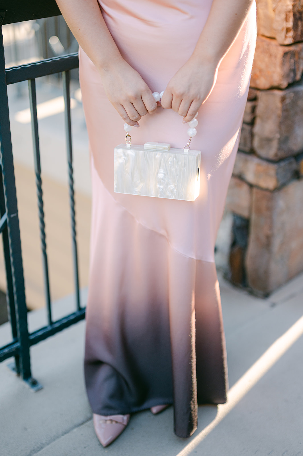 Detail shot of a wedding guest purse.