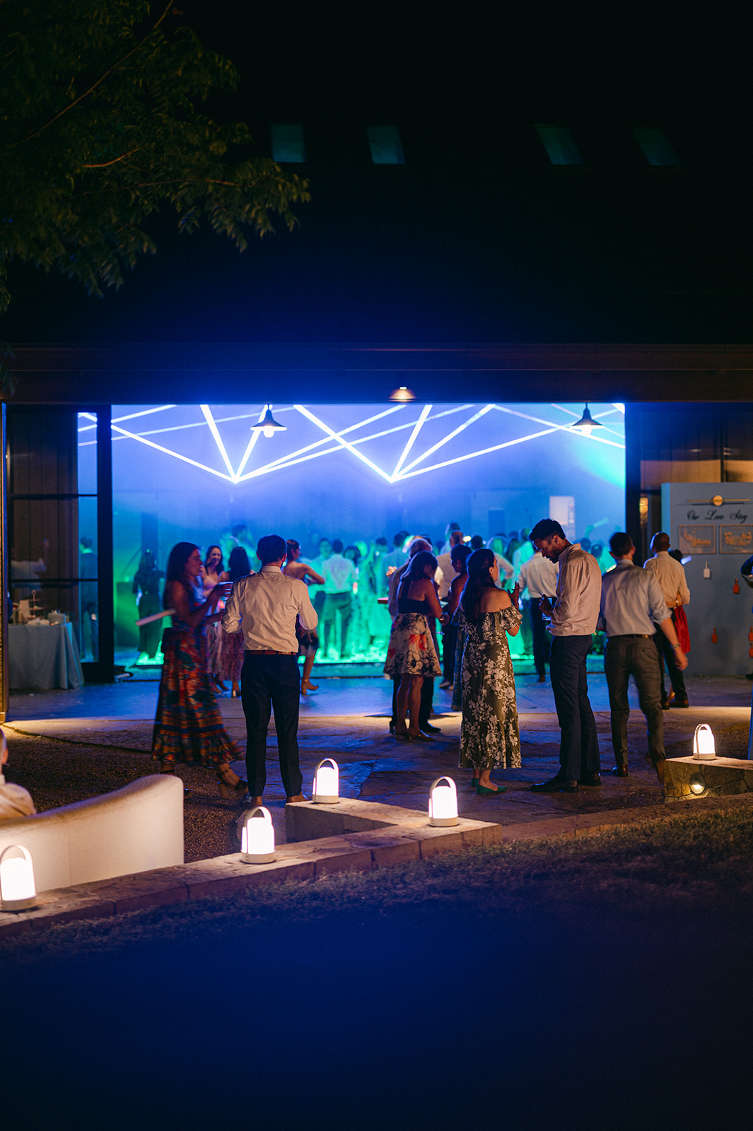 Wedding reception party with Vegas nightclub energy.