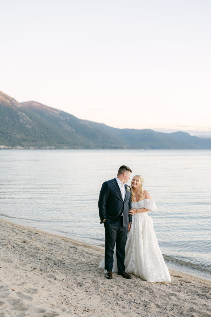 Bride and Groom share a moment during sunset on a private beach wedding venue in Lake Tahoe.
