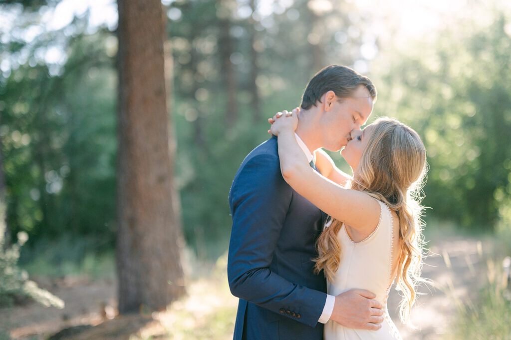 Bride and Groom kiss at Zephyr Lodge at Northstar